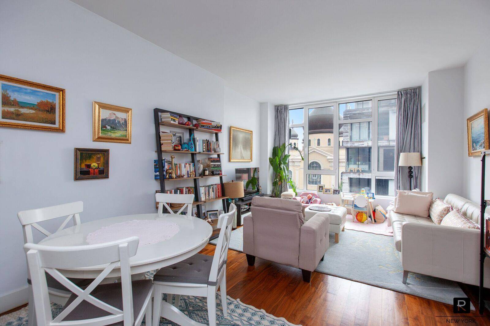 Spacious, sun filled, 2 bedroom 2 bath condo unit at Warehouse 11 in Northpoint Williamsburg boasts North and South exposures.