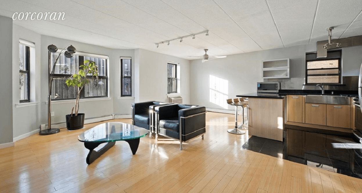 This sunny three bedroom, one and a half bathroom apartment in Fort Greene is located on the second floor of a charming brick exterior condominium.