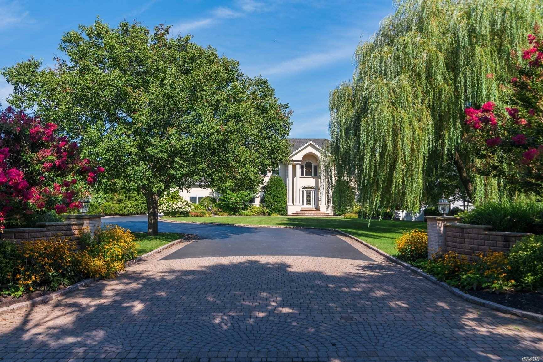 Stately Waterfront Colonial On Shy 1 acre property Down Coveted West Islip Rd.