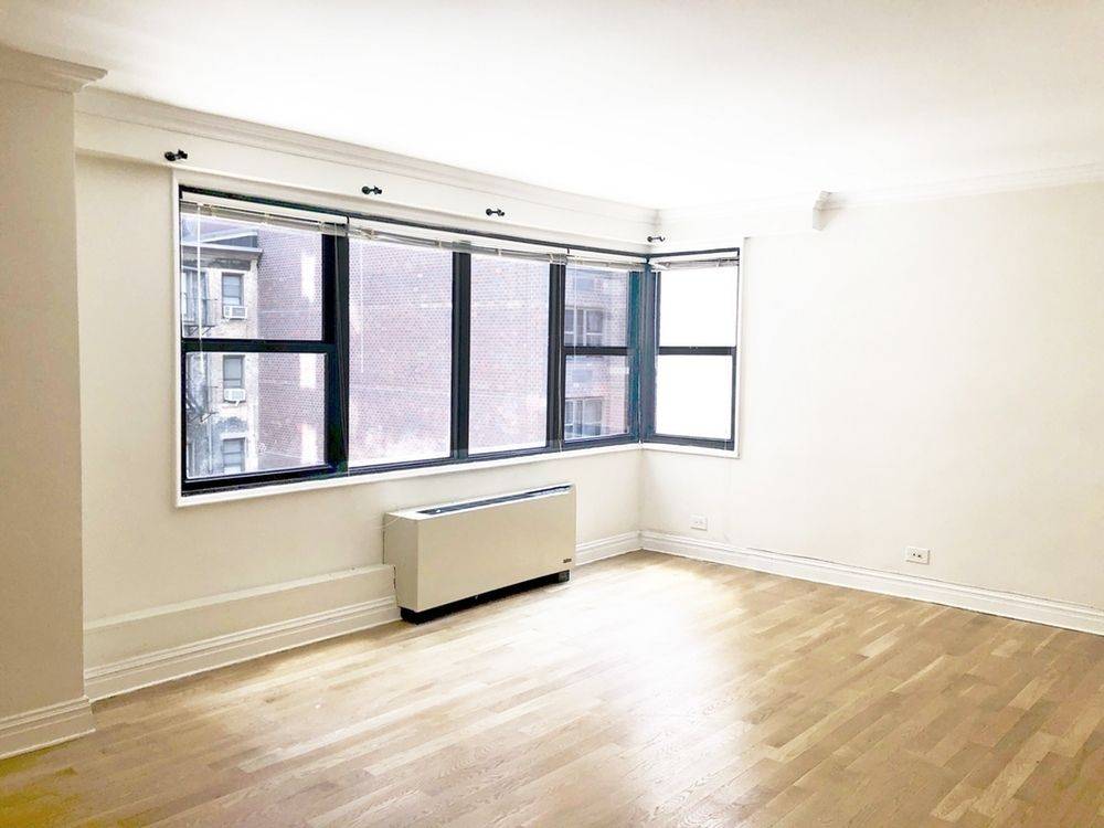 NO FEE! SPACIOUS STUDIO WITH A SEPARATE KITCHEN, GREAT CLOSET SPACE AND INTERIOR EXPOSURE.