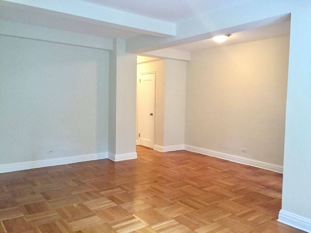 NO FEE! LARGE STUDIO APARTMENT WITH NATURAL LIGHT, SEPARATE WINDOWED KITCHEN, HARDWOOD FLOORS, AND AMPLE CLOSET SPACE.