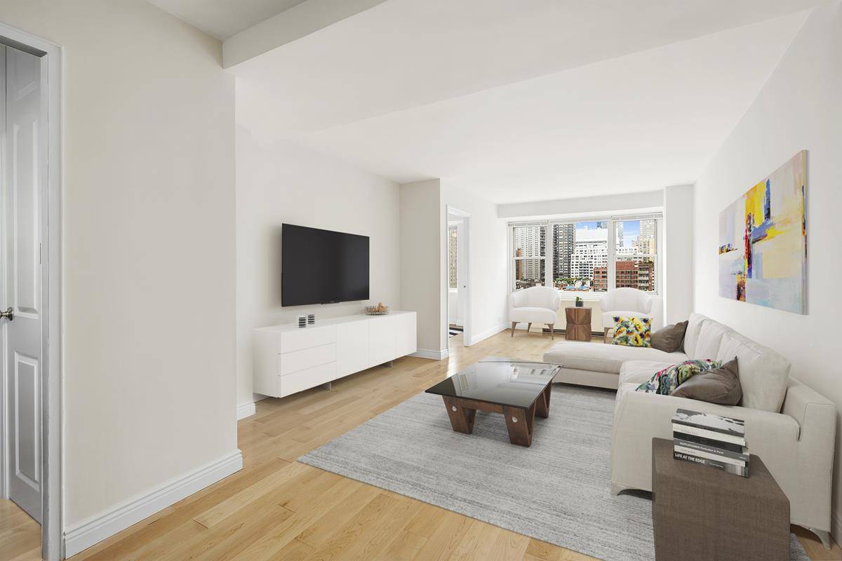 With broad city views to the South and East, pindrop quiet, and very sunny, 12 E has an offset layout that is makes this converted two bedroom work like no ...