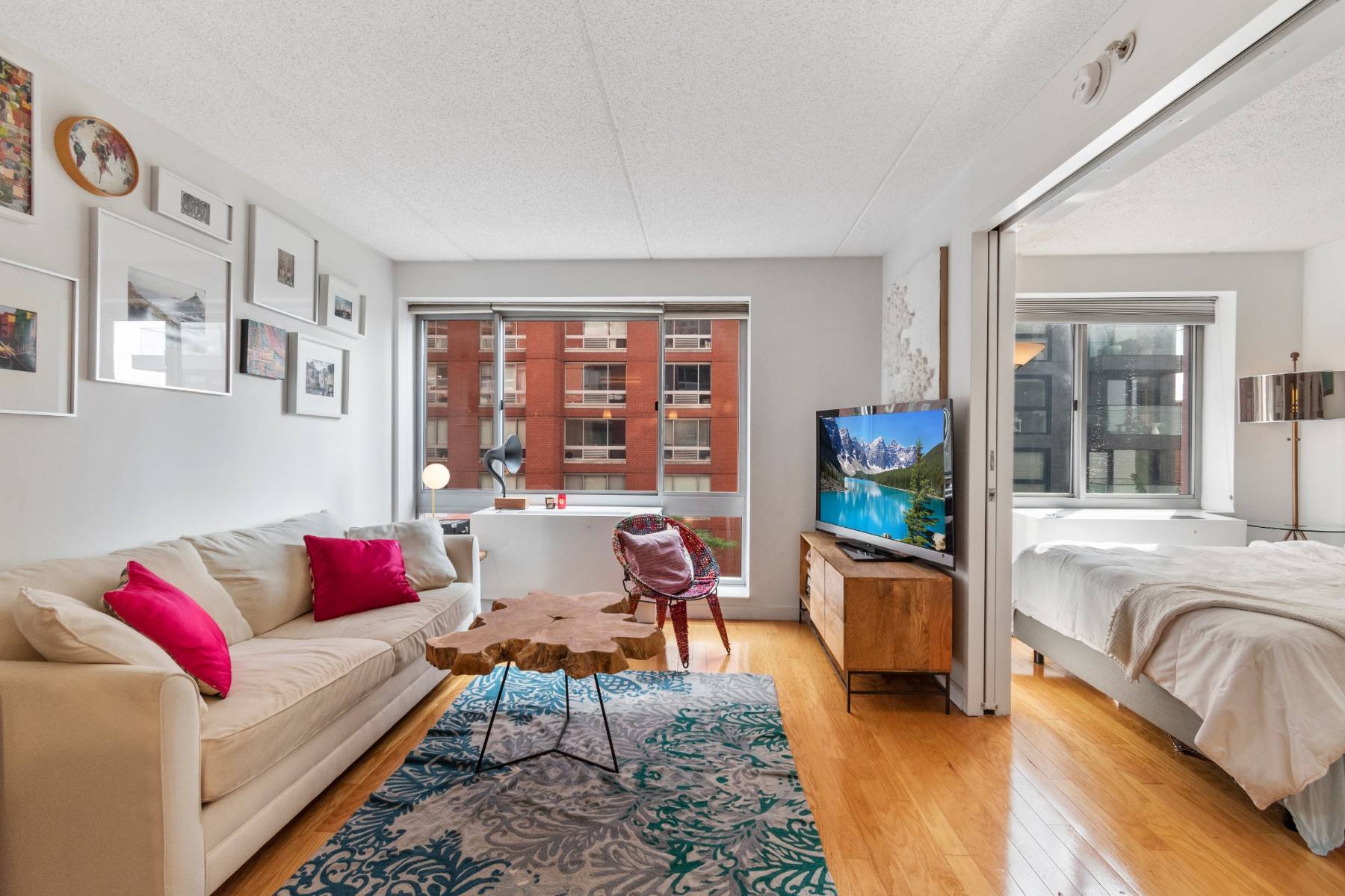 This one bedroom apartment in the heart of the West Chelsea Art District offers an open kitchen with breakfast bar that is perfect for entertaining guests.