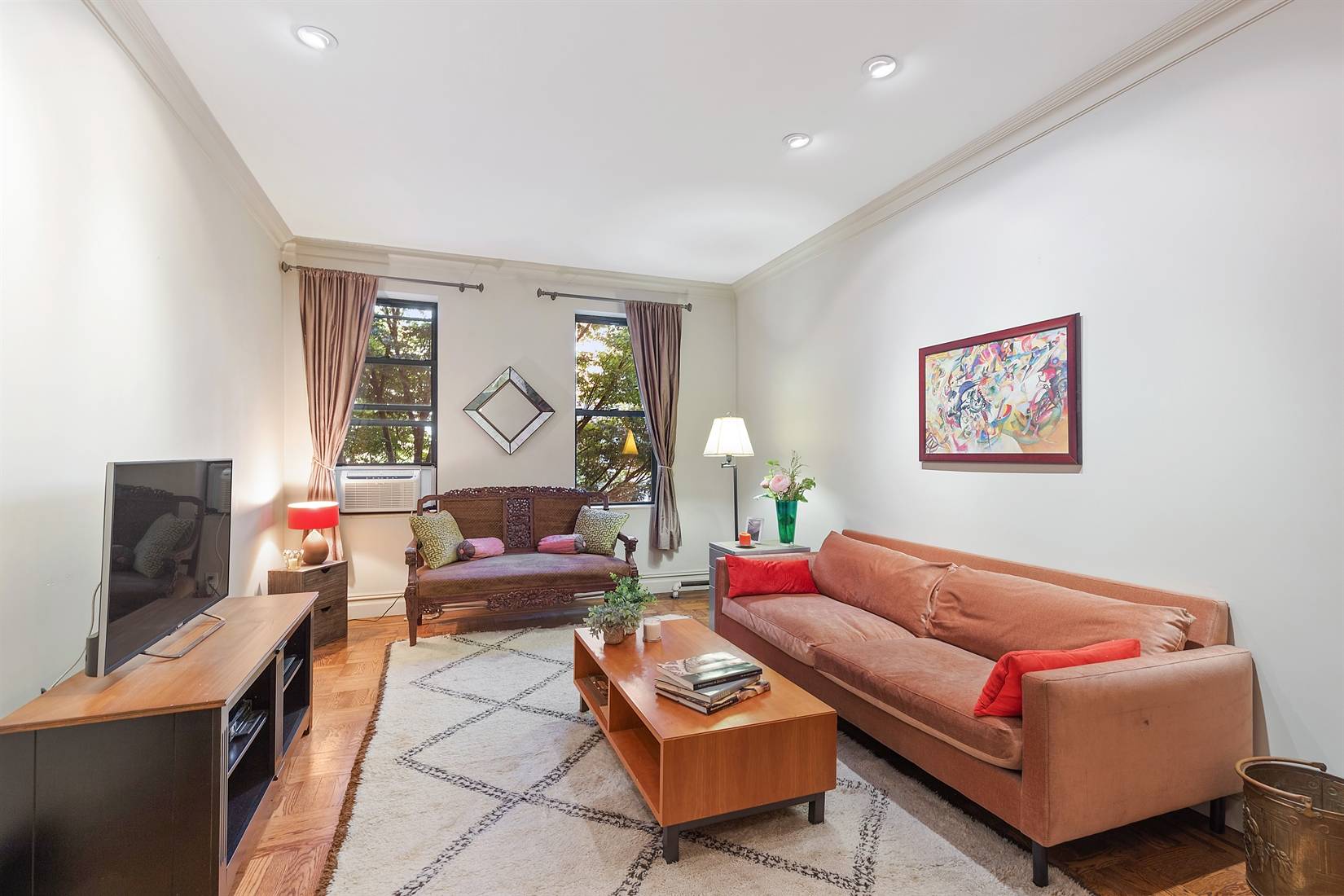 SERENE ONE BEDROOM OVERLOOKING TREE LINED CABRINI BLVD Surrounded by pretty leafy views from all windows, this prewar gem is the calm oasis that every HOME should be.
