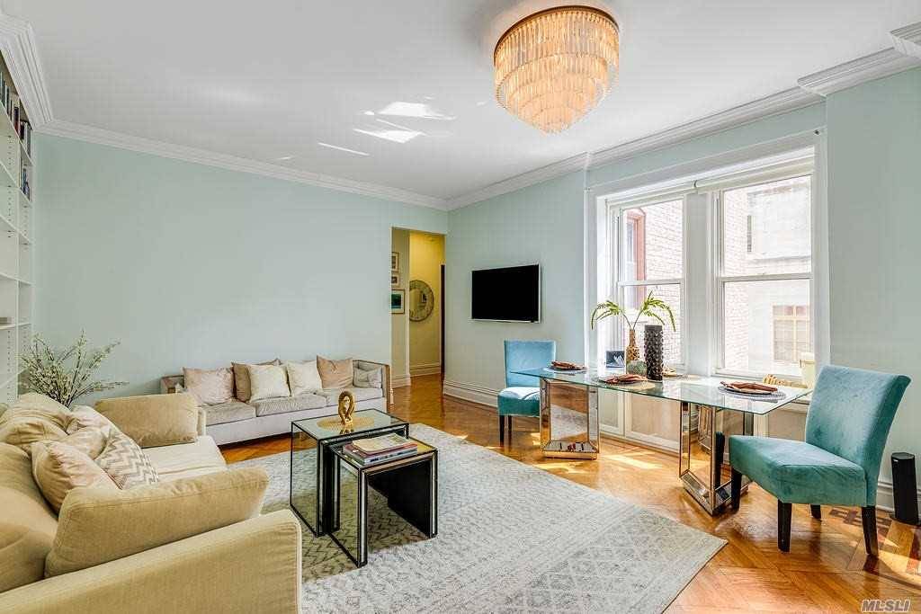 Look No Further ! Spacious extremely bright renovated 2 bedroom one bath Co op in a pre war elevated building centrally located in Brooklyn Heights.
