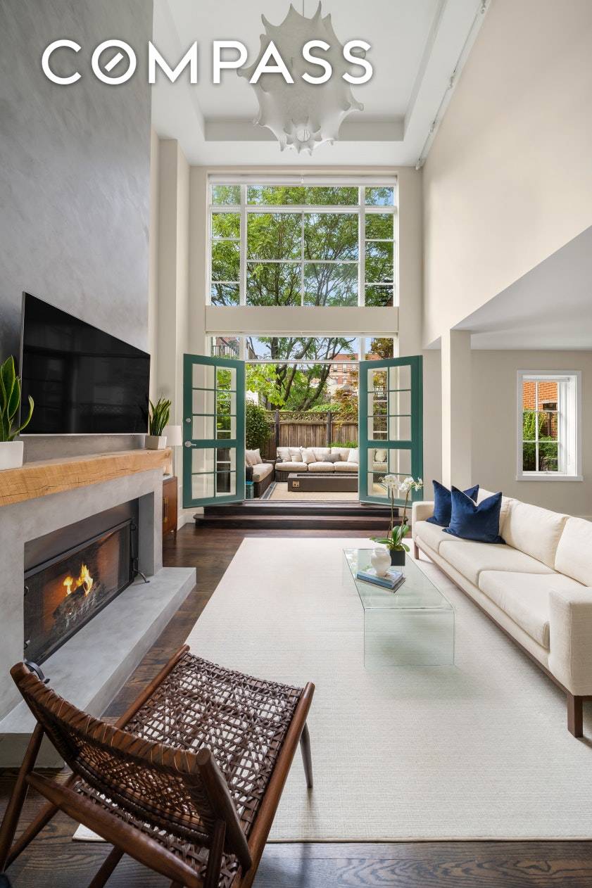 Unparalleled indoor outdoor living with two working fireplaces !