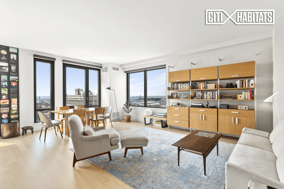Massive two bedroom two bathroom home with spectacular city and harbor views from its large private terrace.