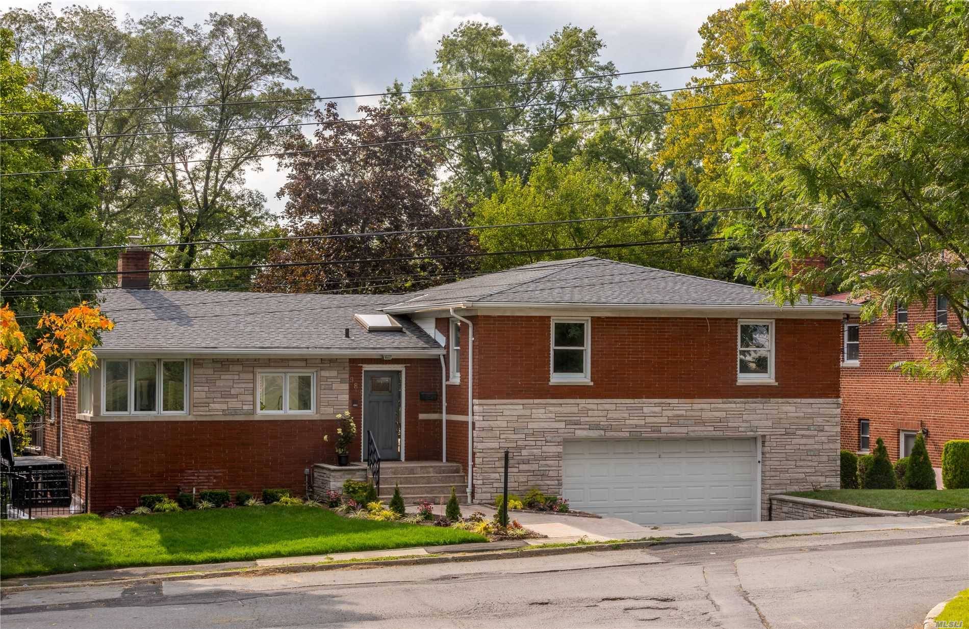 Charming Split level home on a quiet residential Street with so much to offer.
