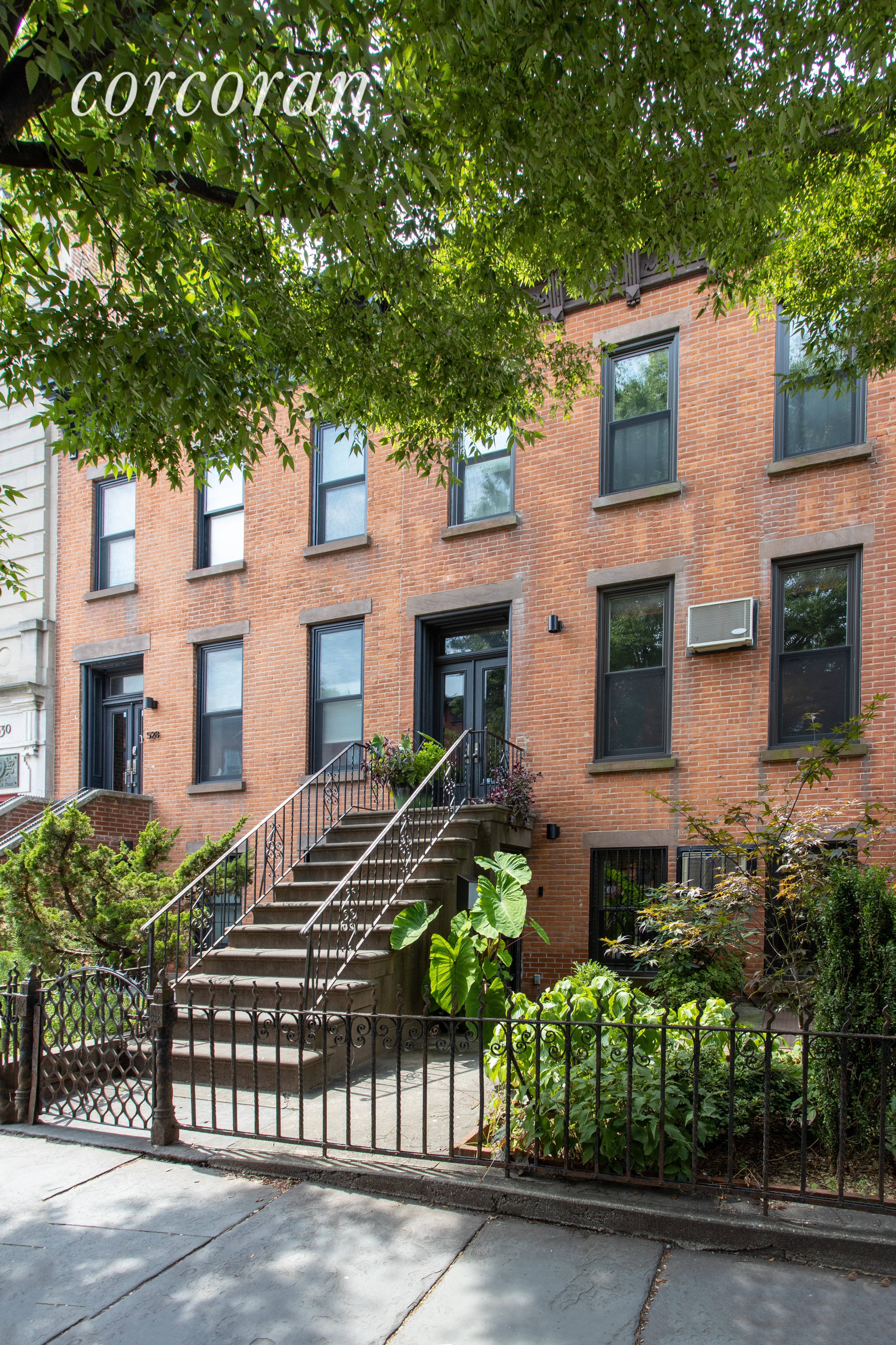 Welcome home to 526 11th street, a 20 ft wide legal 2 family brick townhouse currently configured as a thoughtfully renovated single family home.
