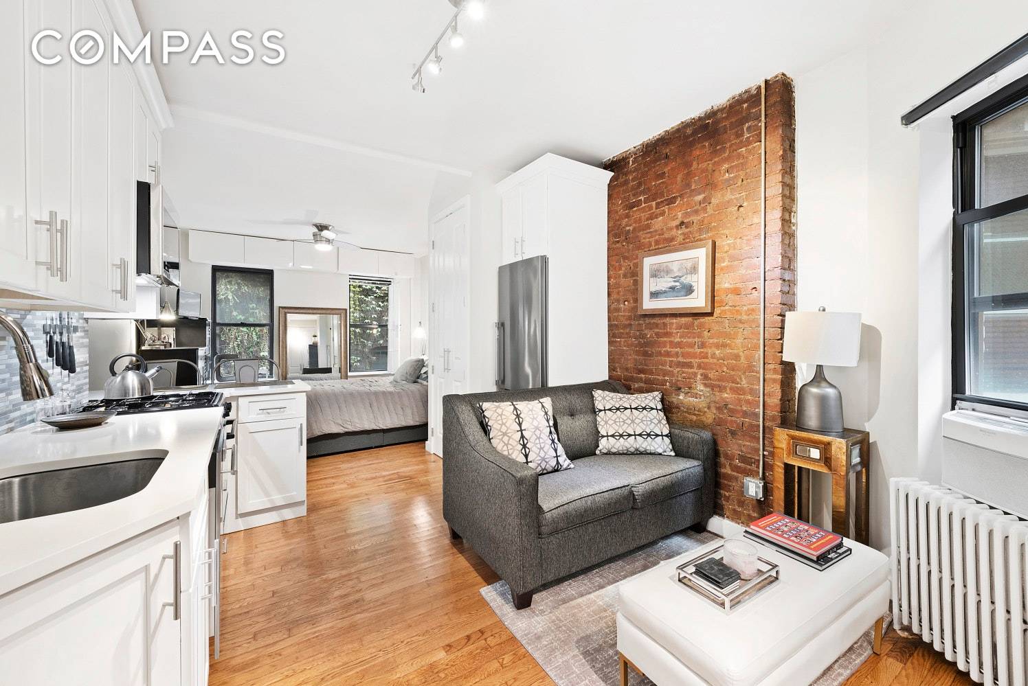 Meticulously renovated one bedroom floor through apartment at 646 Ninth Avenue in the heart of vibrant Hell s Kitchen.