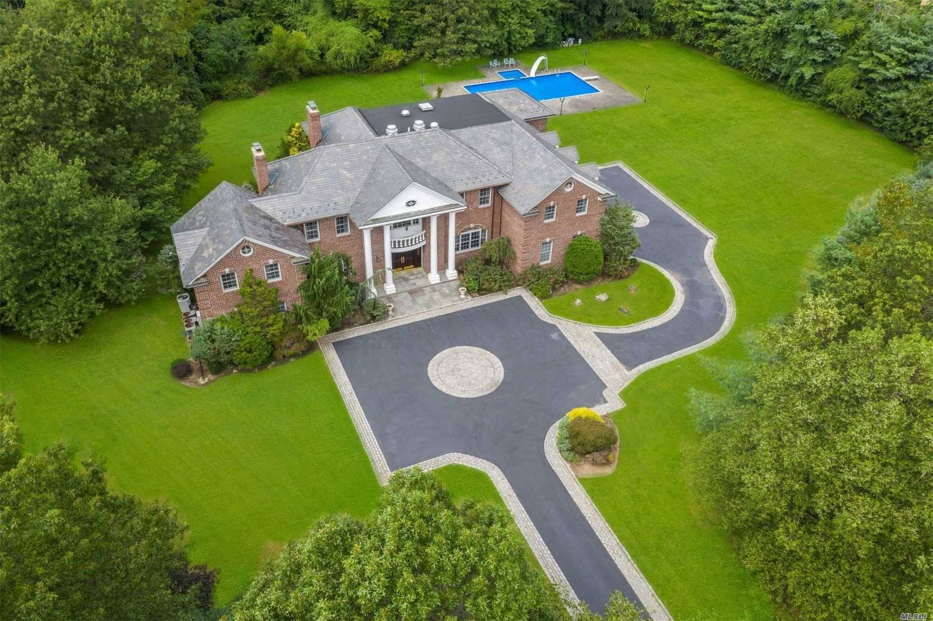 This Brick Colonial Masterpiece, That Sits On 3.