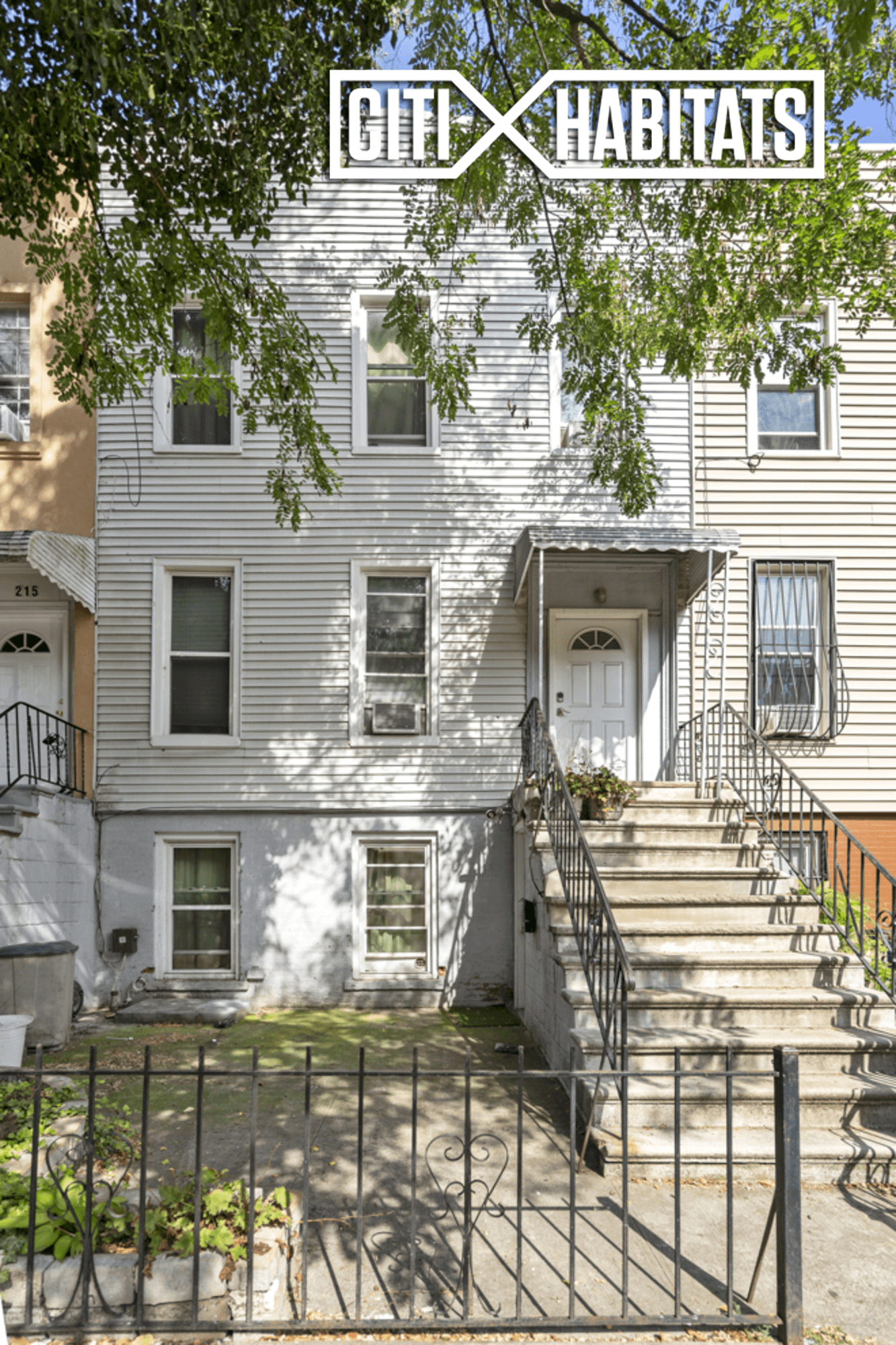 2 Family Home for Sale located on a tree line street in Bushwick.