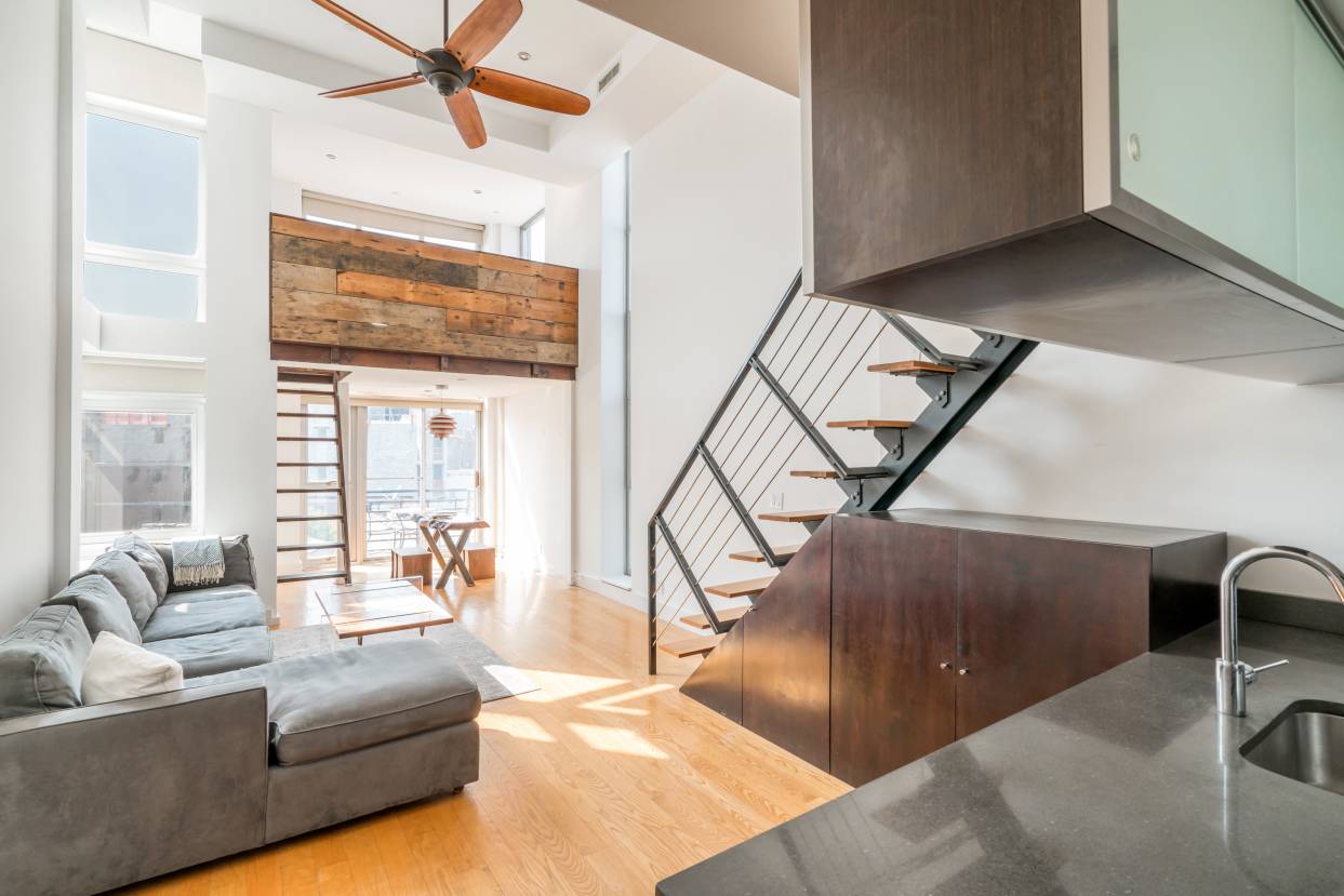 Sunny duplex loft featuring three private outdoor spaces, two loft areas, 15.