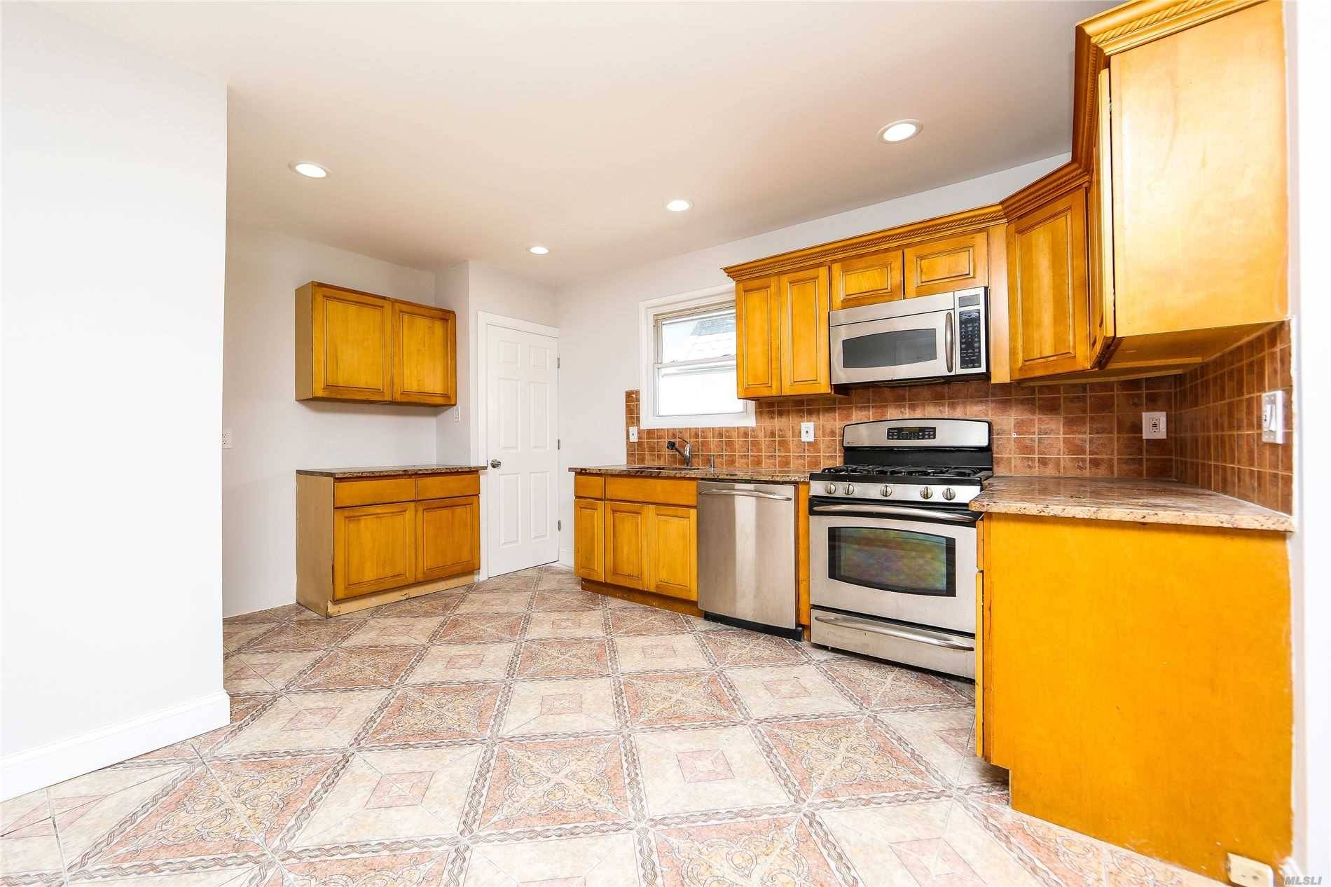 just bring your things live in this newly renovated single family townhouse featuring a wide private driveway Garage.