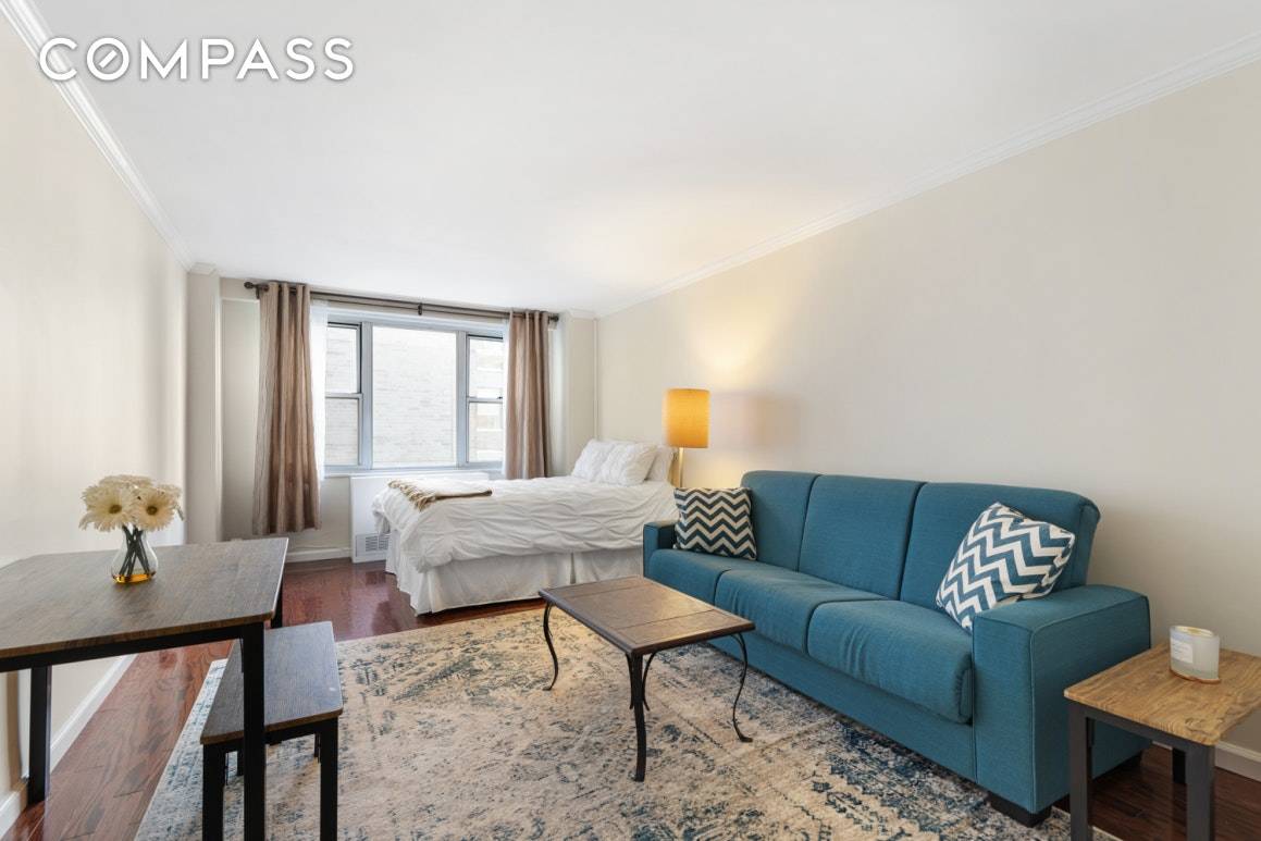 Bright and spacious studio with renovated bath, updated kitchen, beautiful strip flooring, and three closets all in a full service building in great Gramercy location.