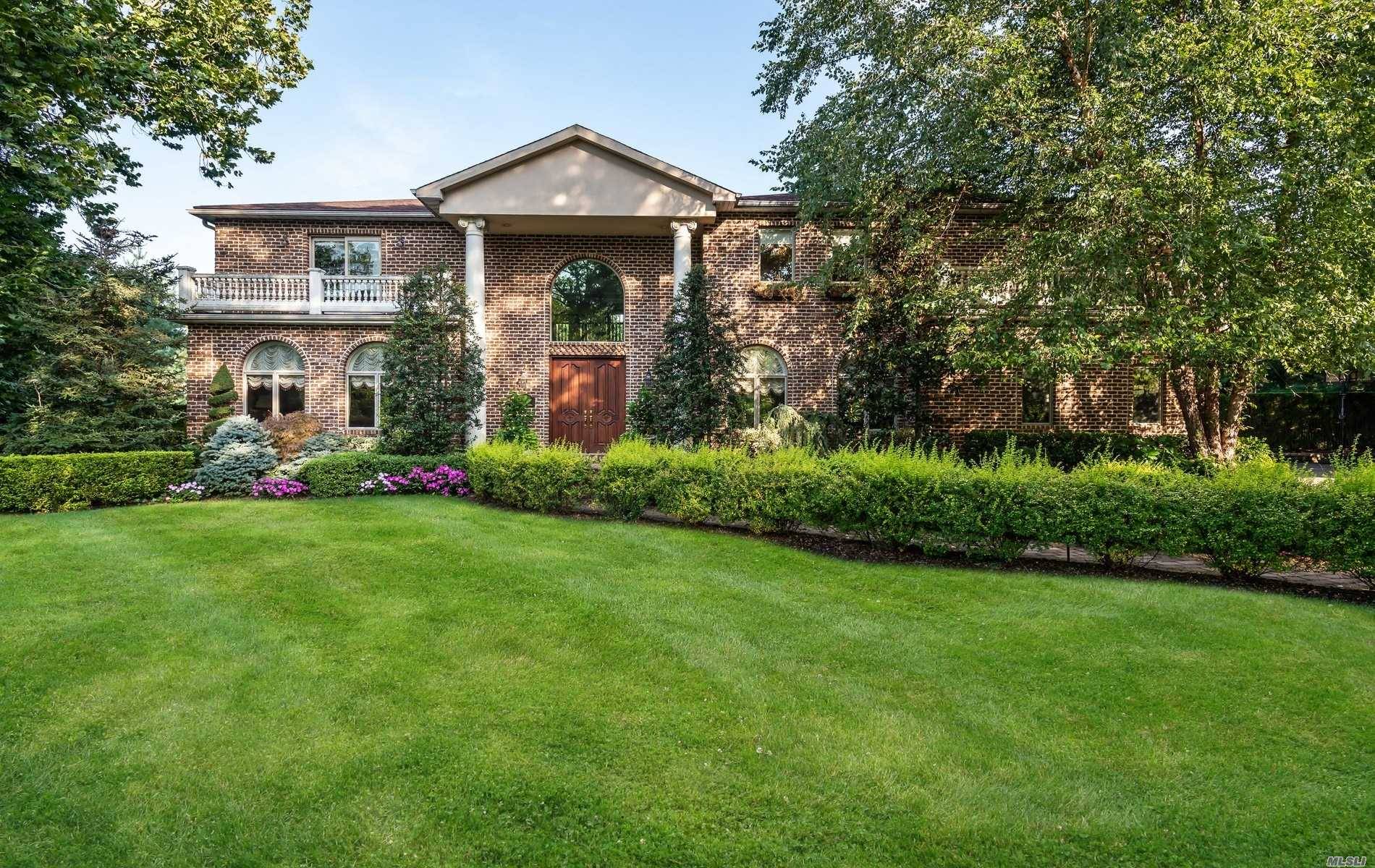 Grand Center Hall Colonial on a Cul de Sac in The Heart of Roslyn Country Club.