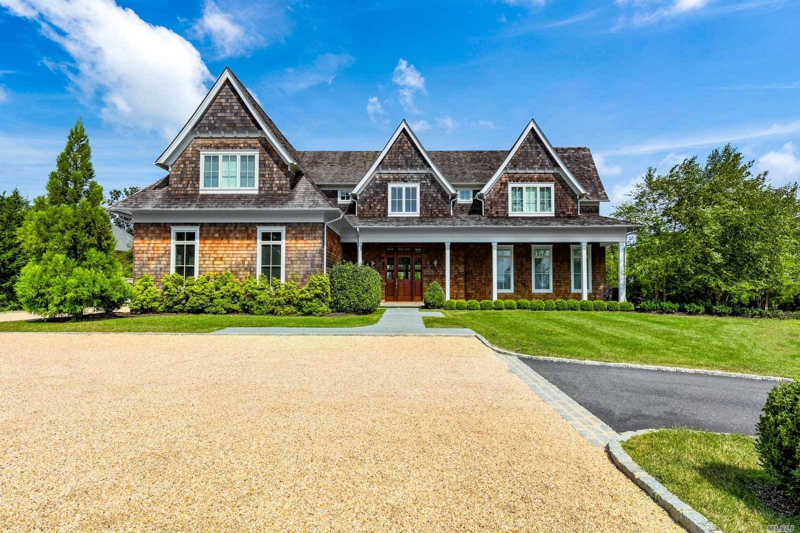 On a quiet lane in Bridgehampton discover this graceful, beautifully finished and appointed turnkey traditional that's well suited to entertaining or relaxing and unwinding.