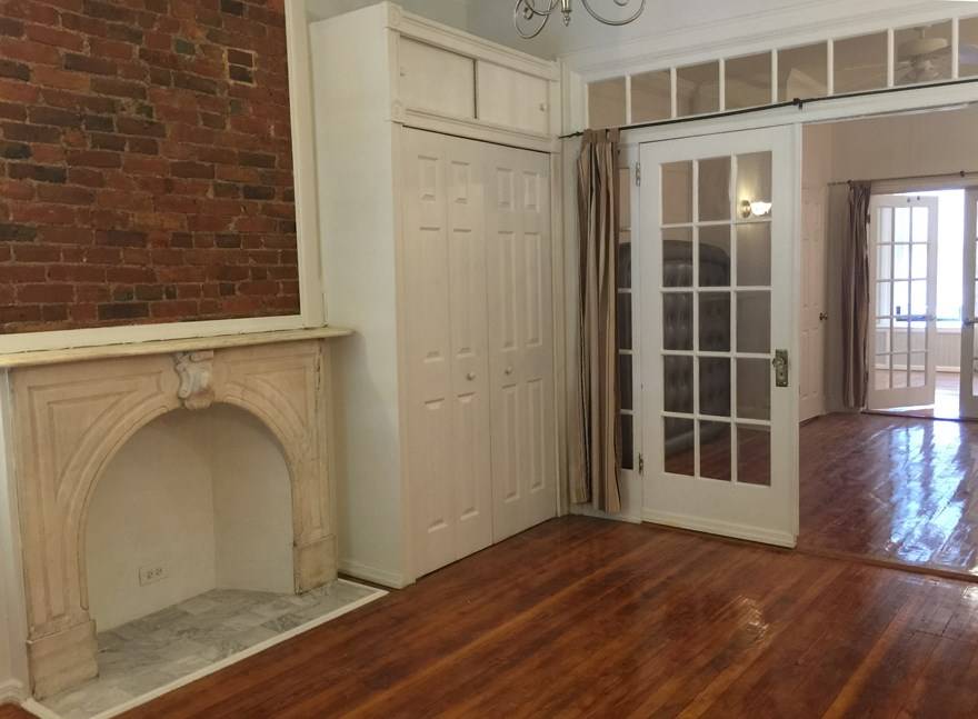 This two bedroom plus center den amp ; two full bath duplex with garden is conveniently located on Clinton Street in the desirable Carroll Gardens neighborhood.