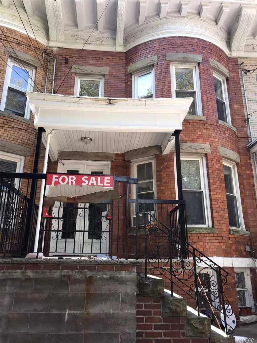 ATTACHED SOLID BRICK HOUSE, 2 BEDROOM APARTMENT EACH FLOOR, SEPARATE ENTRANCE TO BASEMENT, FINISHED BASEMENT WITH MANY WINDOWS.