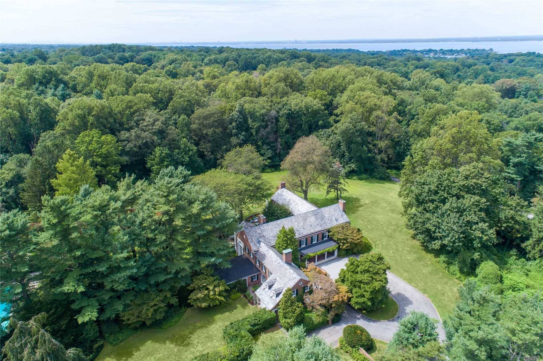 Long Field, designed by renowned architect Bradley Delahanty in 1928, is protected by 10 rolling, serene private acres.
