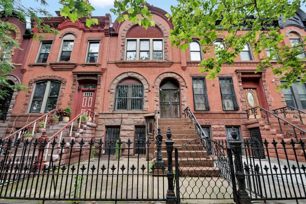 Absolute one of a kind. Bring your contractor and architect to this incredible original legal 3 family townhouse on one of the nicest blocks in of all BedStuy guaranteed.