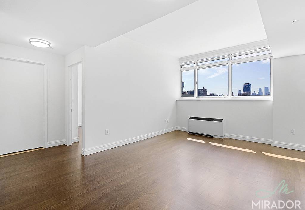 Soar above the New York City skyline in 2011 a completely south facing light flooded, two bedroom, two bathroom home with dining area and washer dryer !