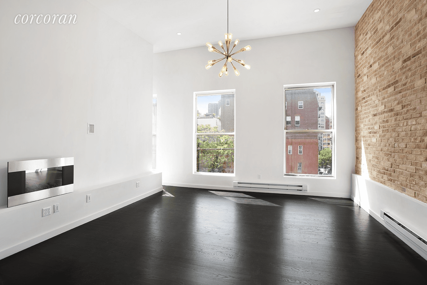 Beautifully restored and GUT RENOVATED Prime TriBeCa loft with huge western facing living room windows.