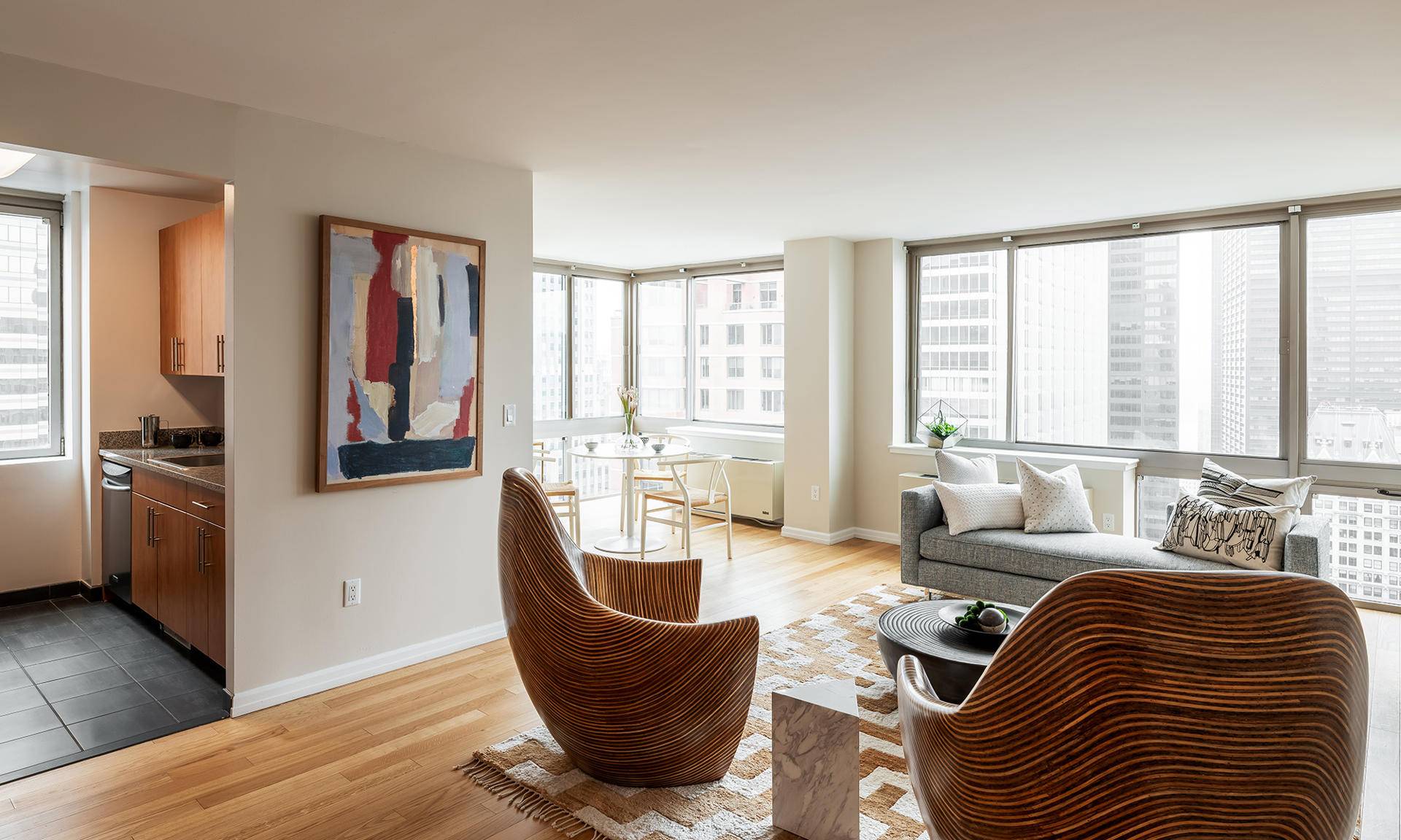 Corner FiDi One Bed/One Bath with Floor-to-Ceiling Views of Midtown