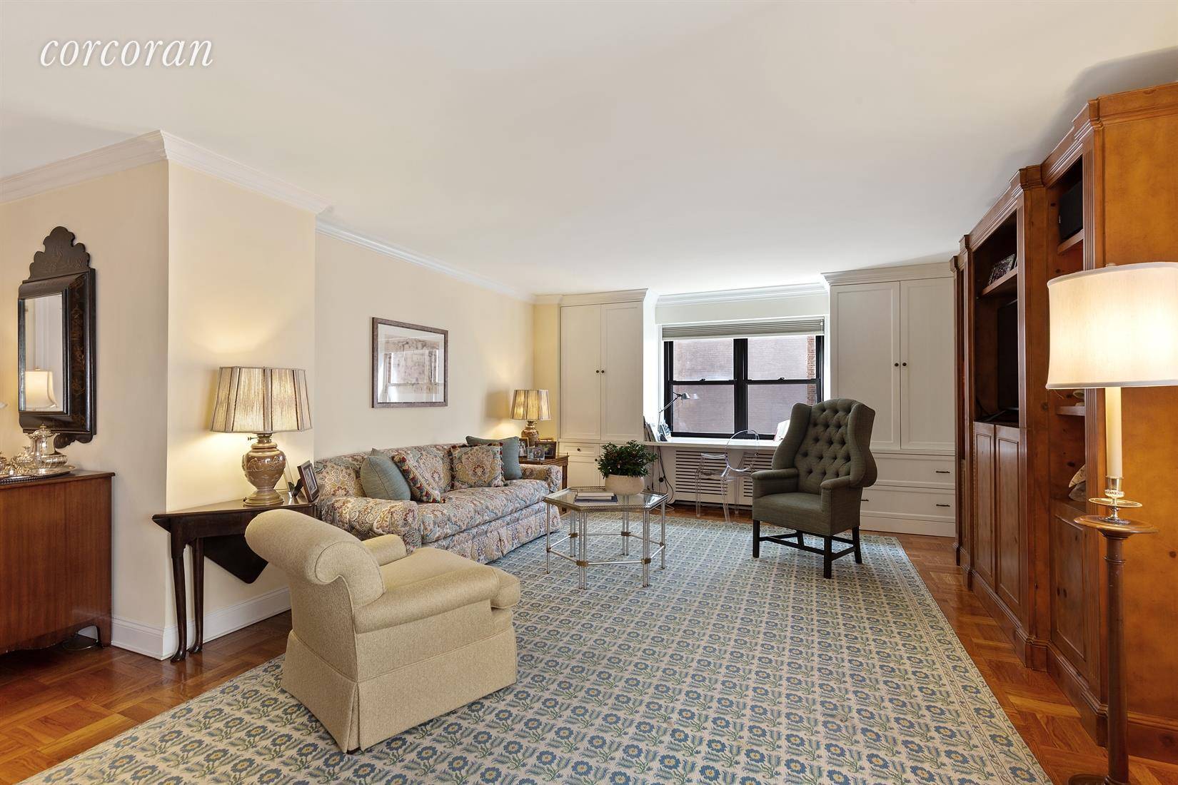 Welcome to this sunny, high floor and pristine Park Ave one bedroom with a spacious alcove featuring pocket doors to serve either as a den or dining room.
