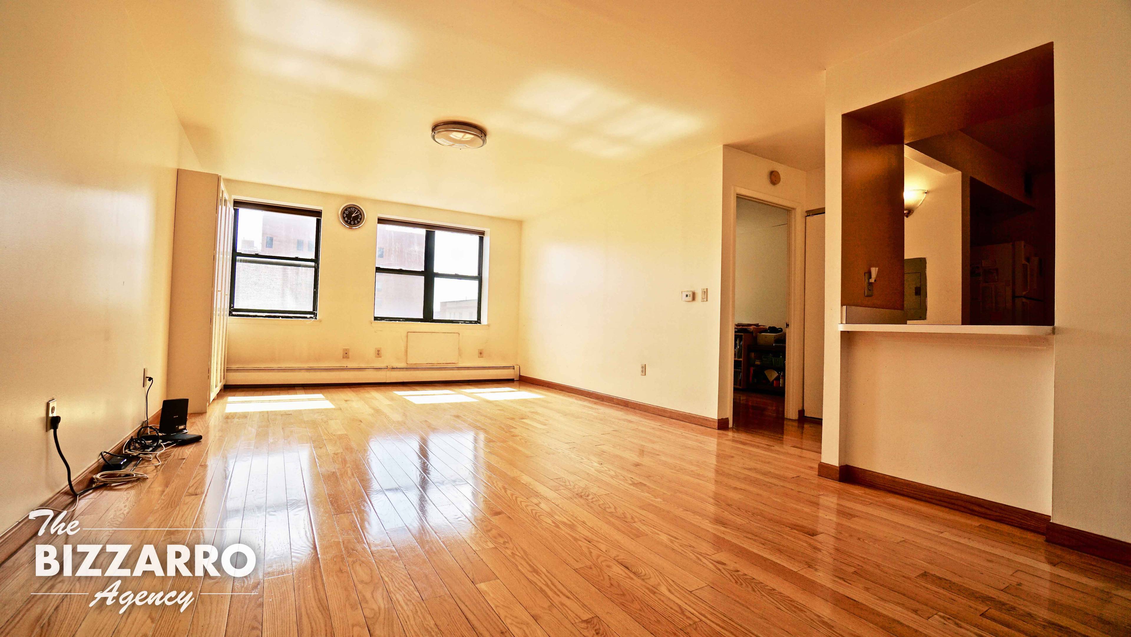 Sunlight abounds in this southern facing split unit 2 bedroom apartment in the middle of bustling Harlem.