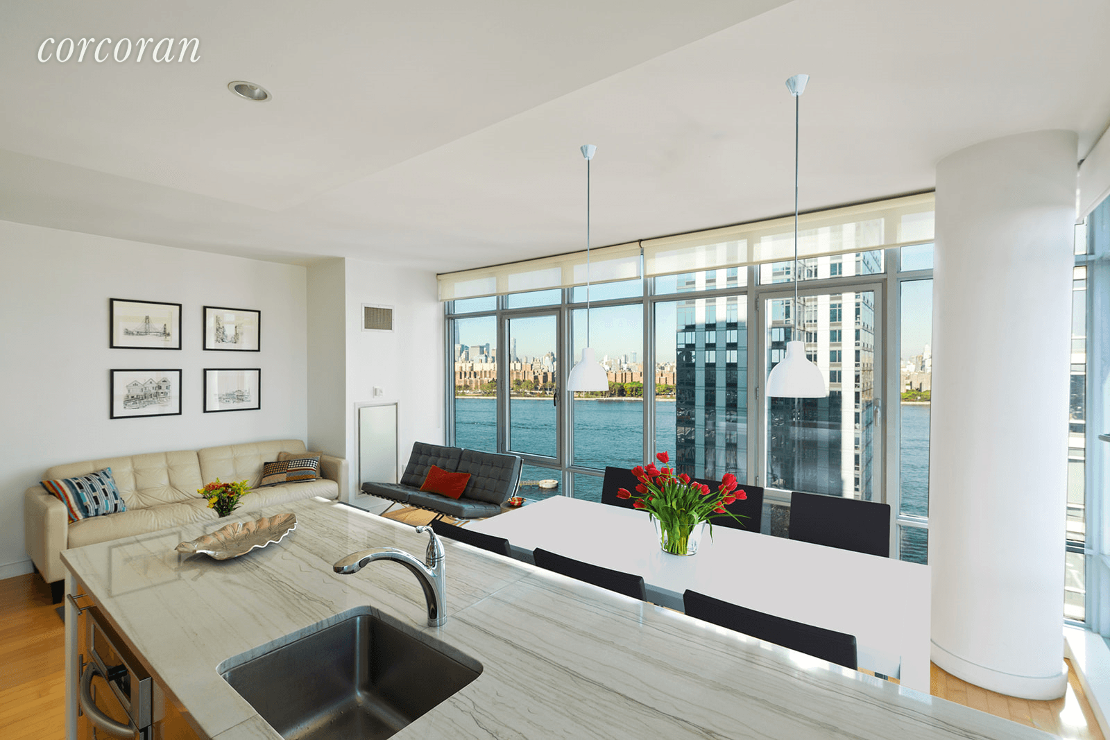 Sweeping sunset city and river views from this impeccably maintained high floor corner 2 bedroom, 2 bathroom residence on the Williamsburg Waterfront at 1 Northside Piers.