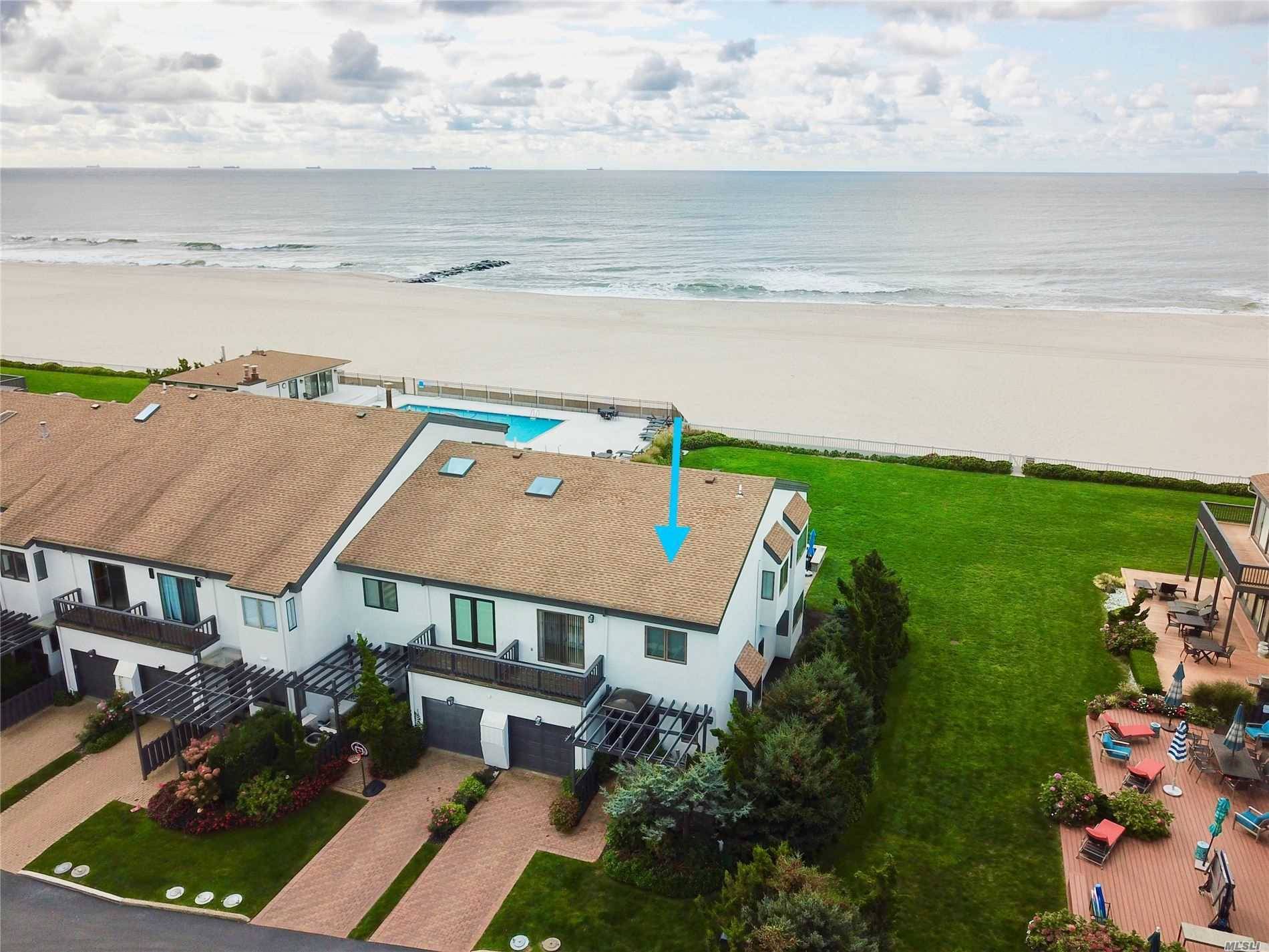 Spectacular Ocean Views Throughout This Contemporary Home Directly On The Beach !