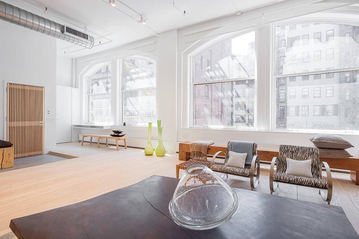 This extraordinary Flatiron Live Work Condo loft has been renovated to the highest standards of quality and craftsmanship and is architecturally stunning.