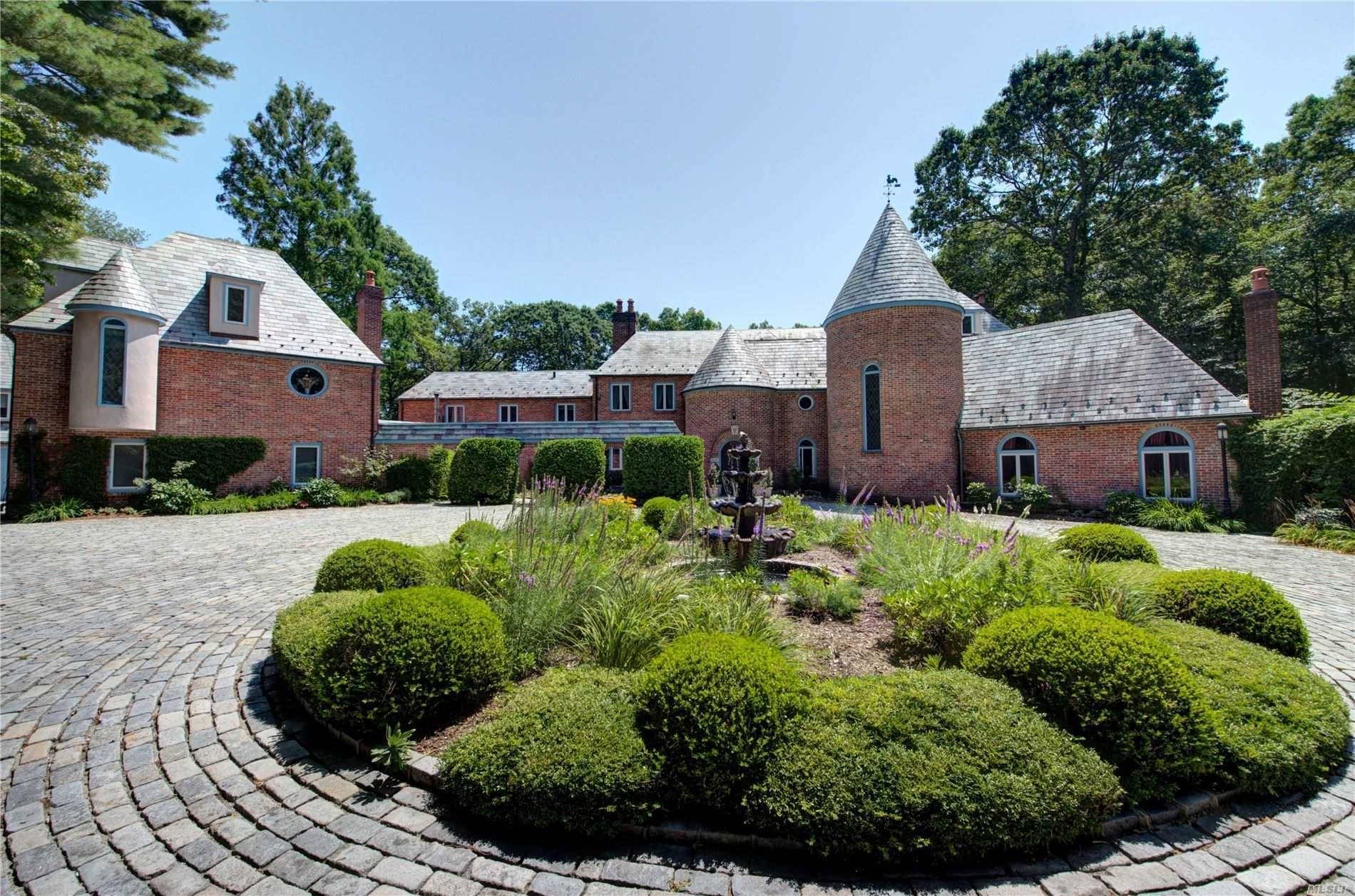 Stunning Brick, Slate Roof French Normandy with Guest House 4 Car Garage.