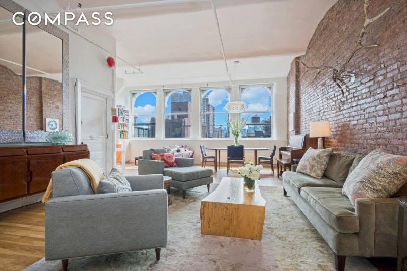 This bright and inviting top floor loft is perfectly located at the center of Greenwich Village.