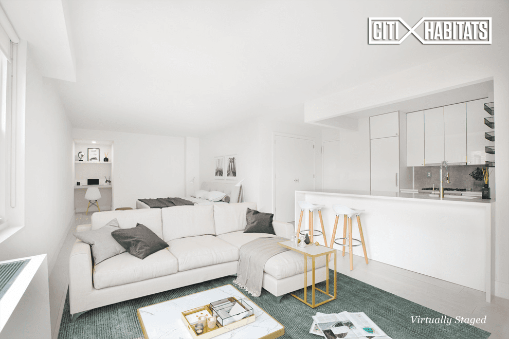 Welcome to this beautiful, newly gut renovated, loft like apartment at the Revere Condominium !