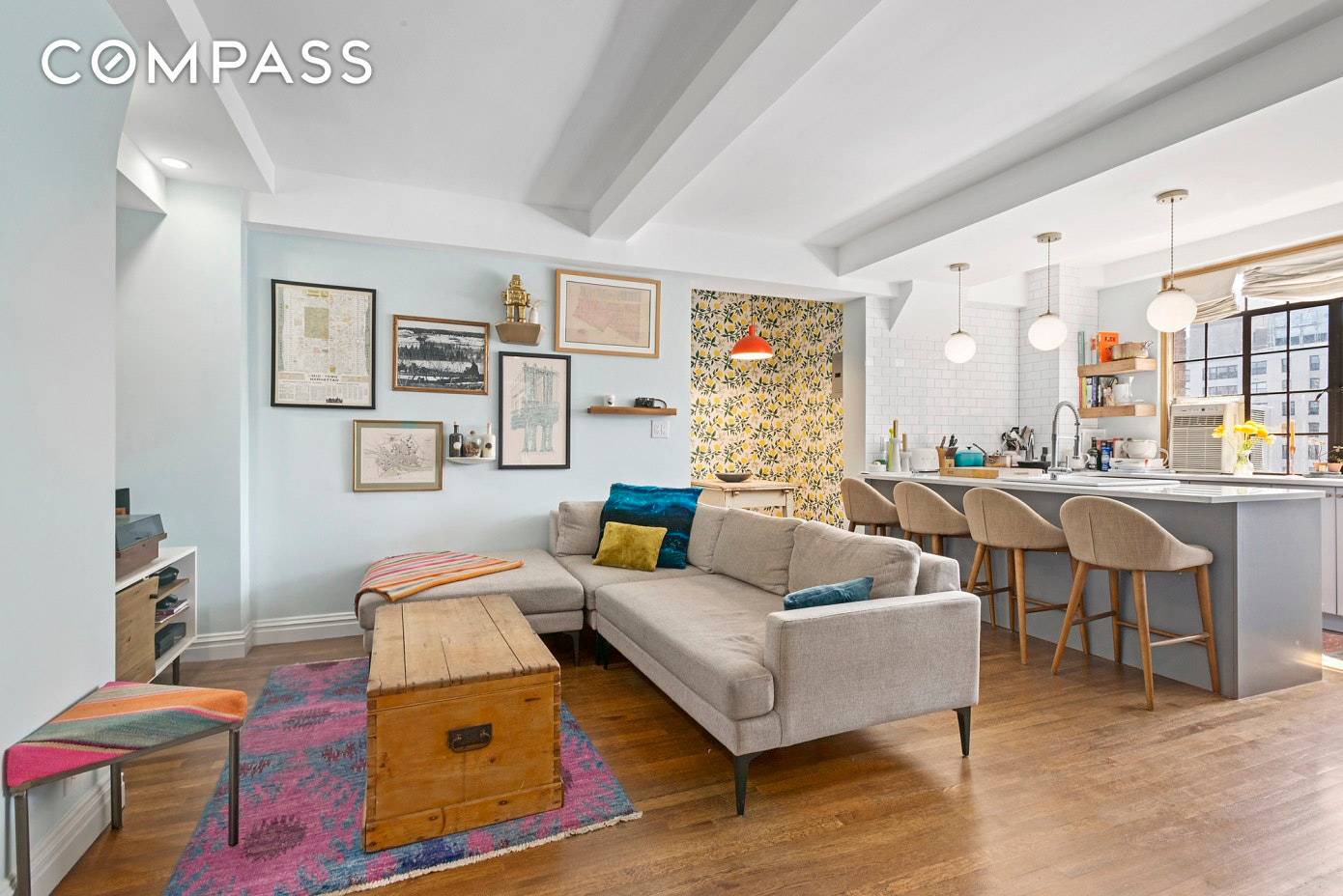 Expertly combined and completely renovated, this rare two bed two bath in a prime Gramercy Park pre war co op exudes charm and style at every turn.