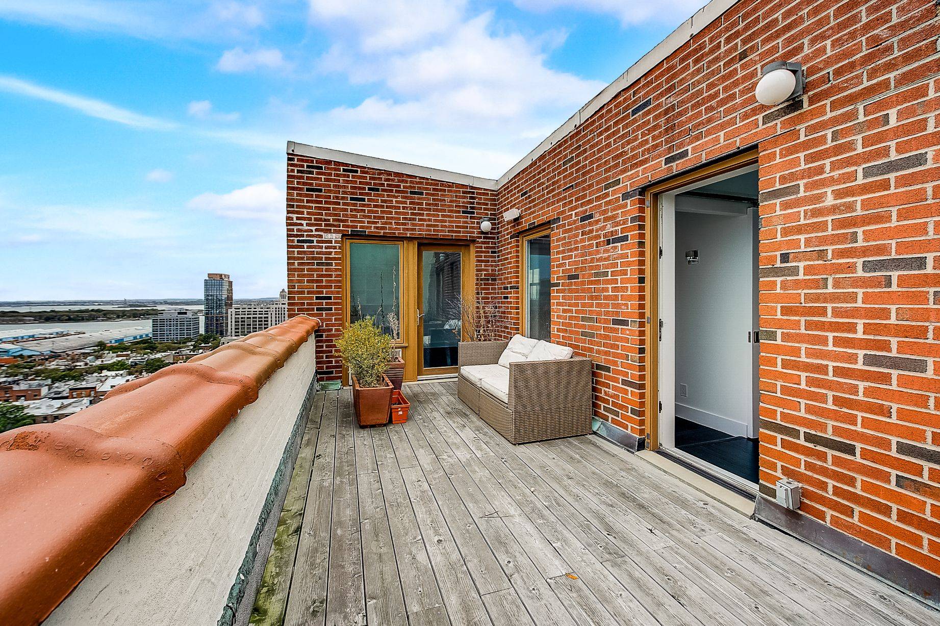 Stunning extra wide duplex corner penthouse with its own private roof deck.