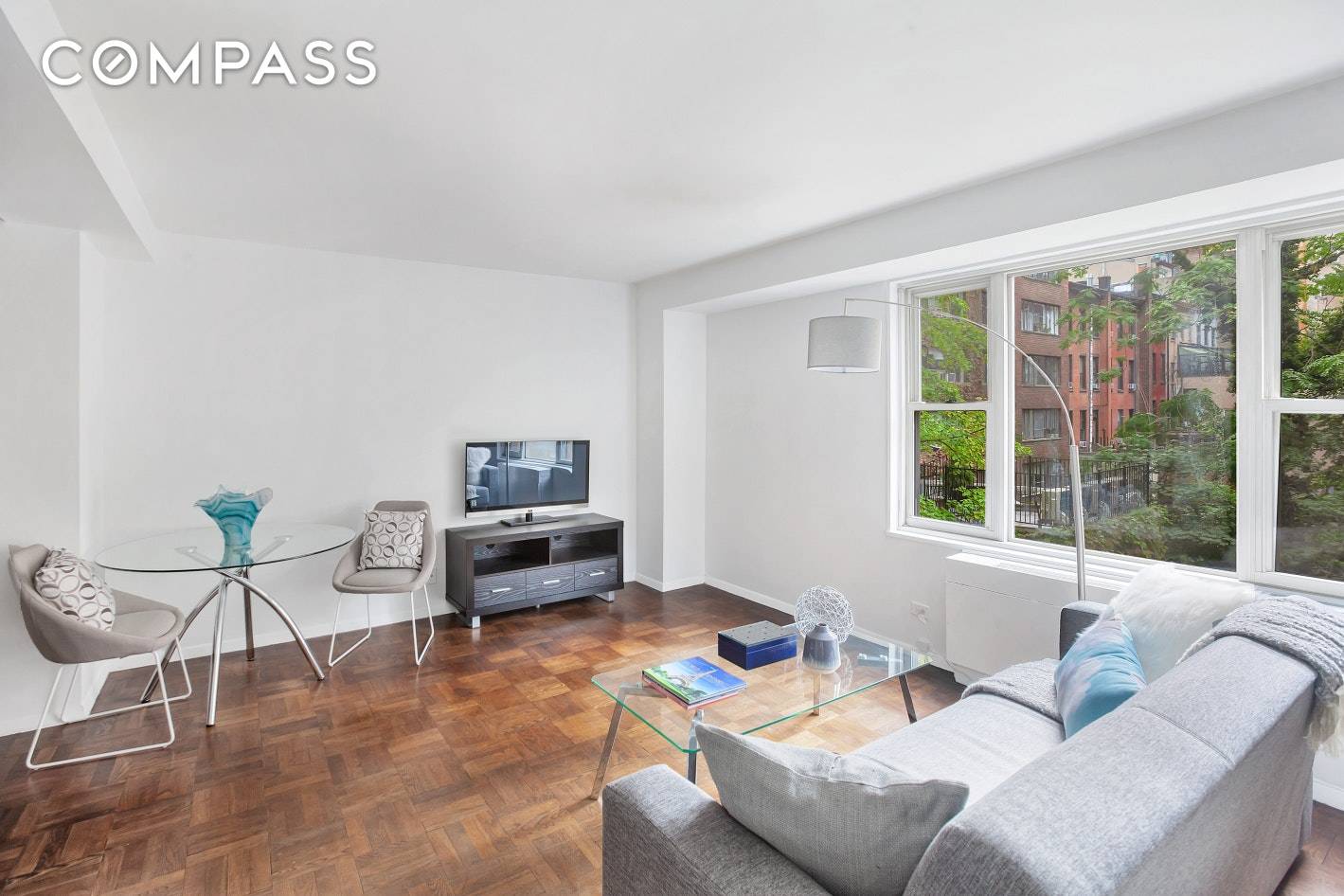 Enjoy tranquil garden views and space in this expansive studio featuring chic modern updates and excellent storage space in a full service Murray Hill co op building.