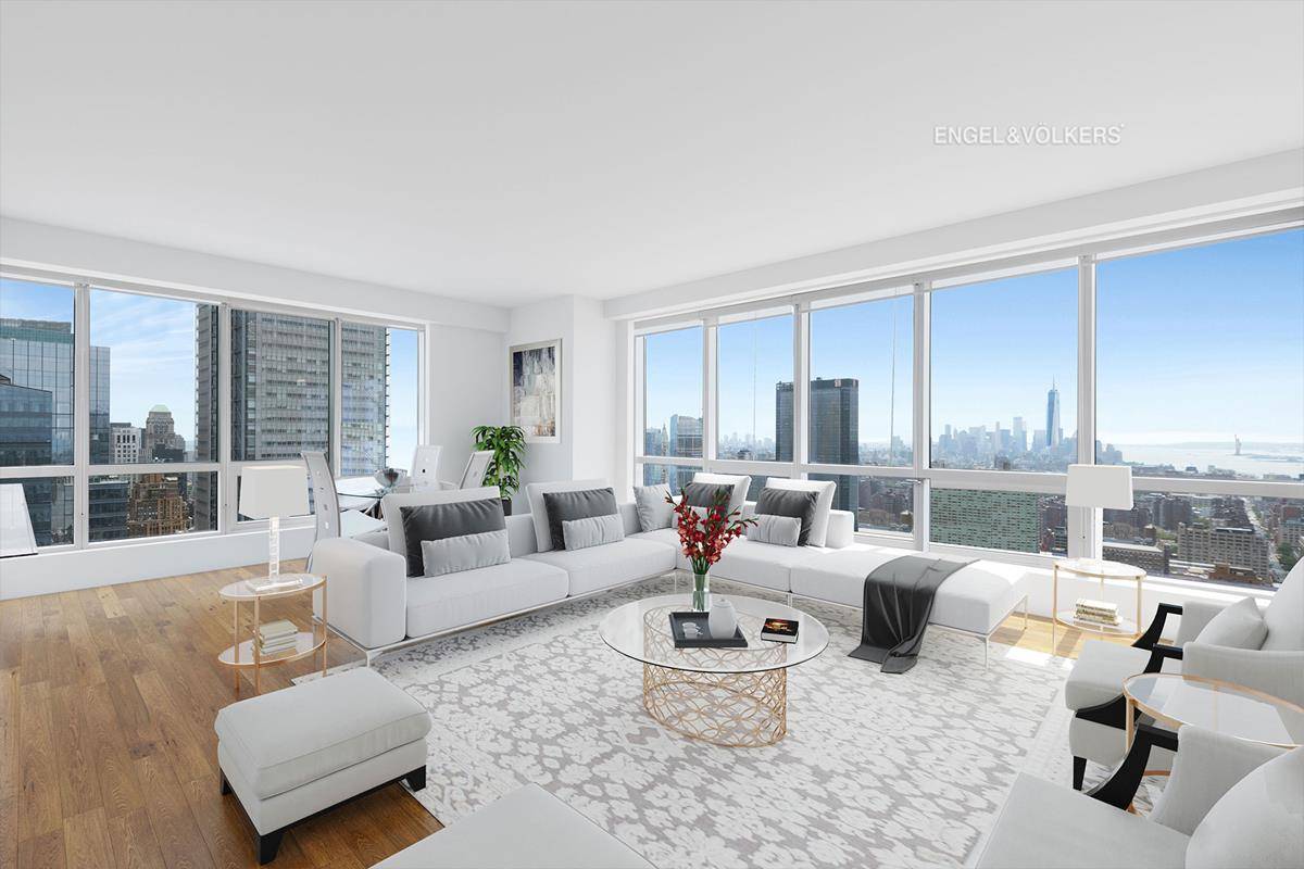 See both the Statue of Liberty AND the Empire State Building from your Midtown living room !