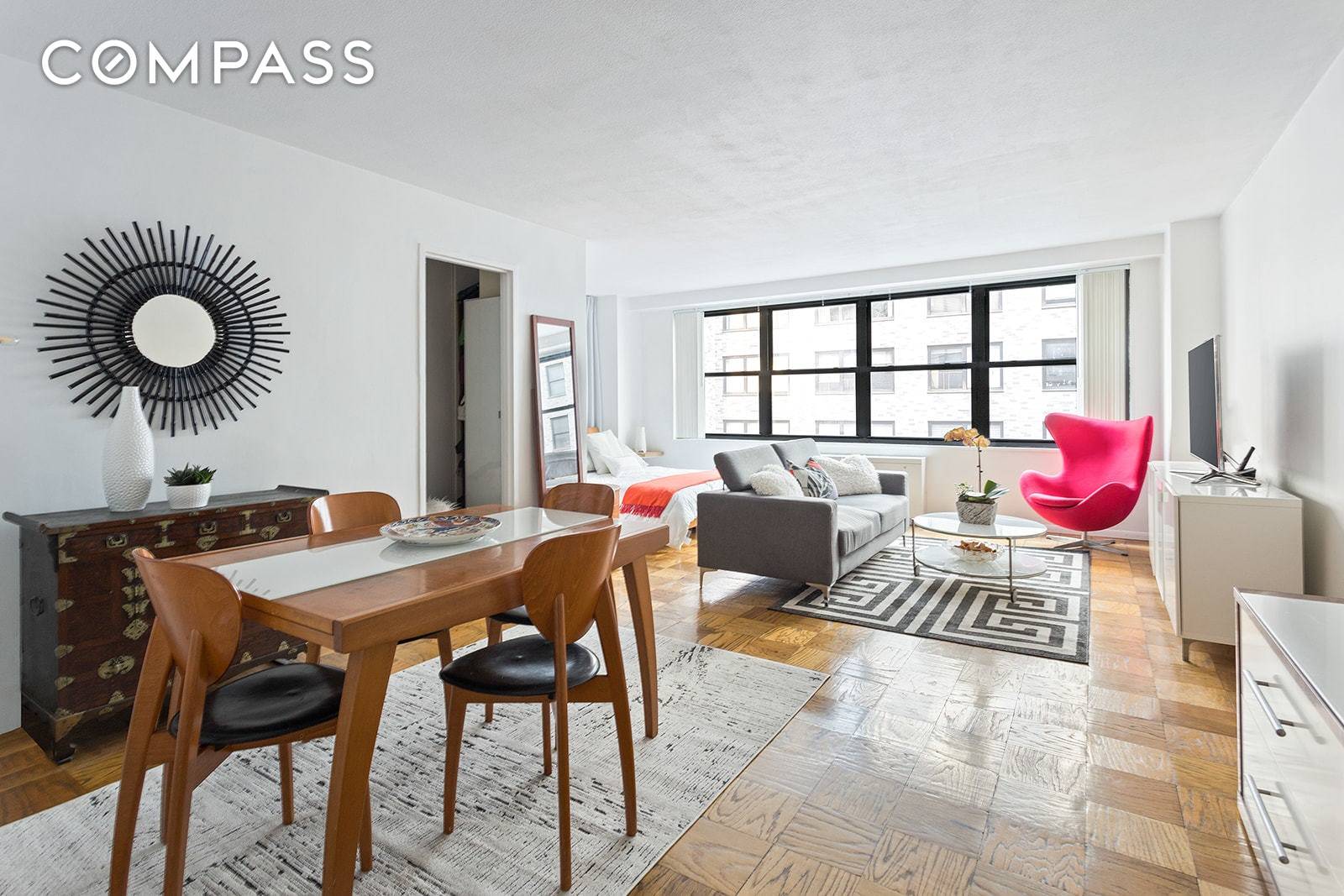 This renovated extra large alcove studio home is bright, quiet and centrally located, making it the perfect Midtown Manhattan home or pied a terre.