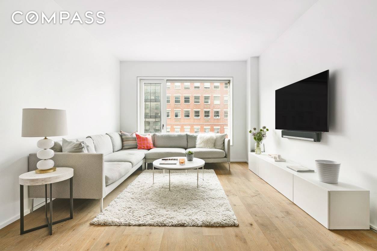 This well proportioned 1, 228 square foot two bedroom, two bath corner residence offers sunny south exposures with views of the Meatpacking District s Gansevoort Square.