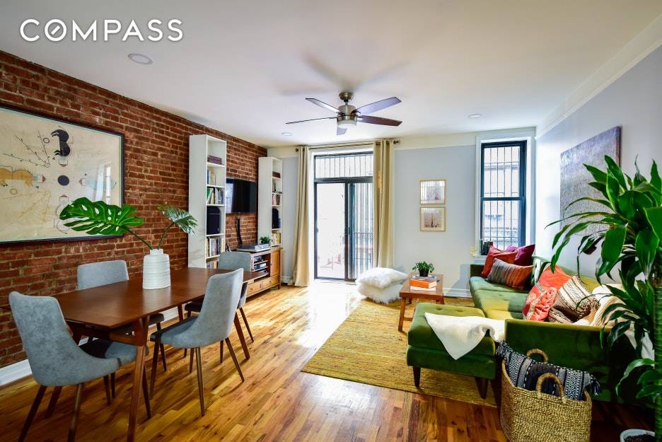 Townhouse living within a cooperative building aptly describes unit 1H and the expansive feel of its 1, 100 square feet of living space.
