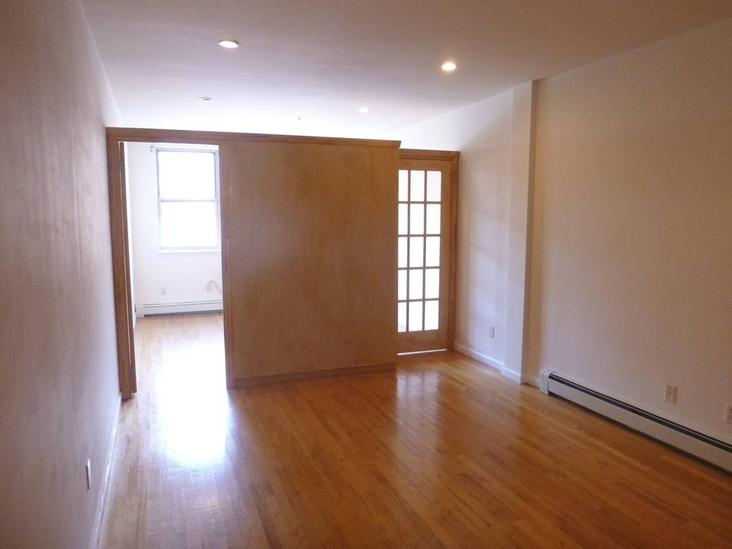 **BEAUTIFUL AND LARGE CONVERTED 1 BEDROOM - $1,775**