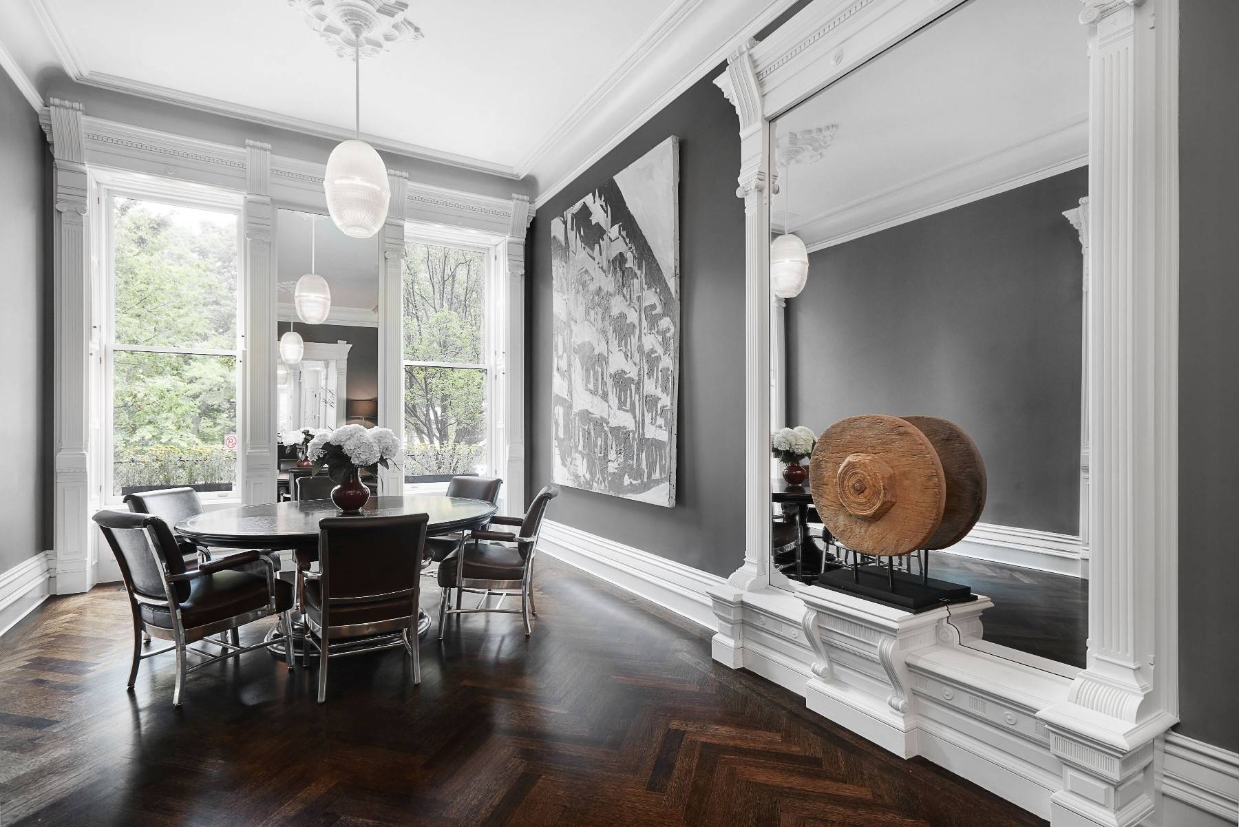 Classic interiors and modern luxuries are tastefully matched in this gorgeous 24 ft wide, five bedroom, seven bathroom, 7, 000 SF town home, located in Harlems historic Mount Morris Park.
