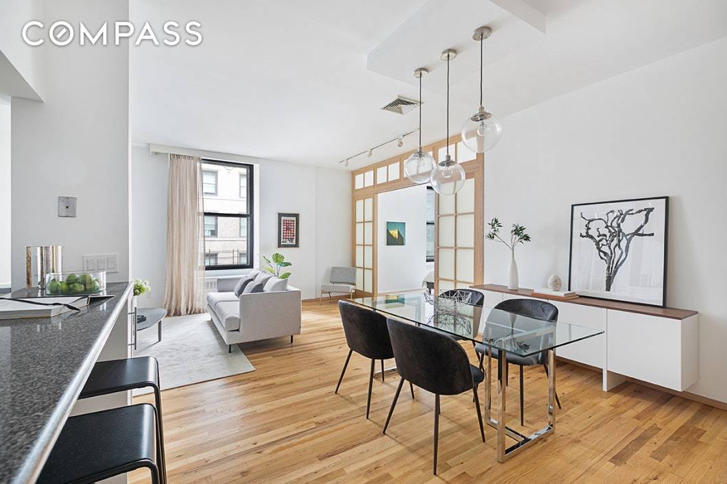 Open, airy 1, 200 square foot one bedroom plus spacious home office currently configured as a second bedroom in prime Fidi.