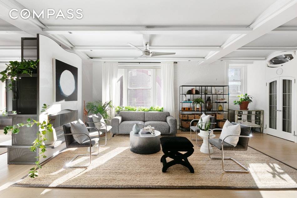 Meticulously planned and beautifully executed, this renovated three bedroom, two bathroom residence is the epitome of Tribeca loft living with exceptional storage and living space.