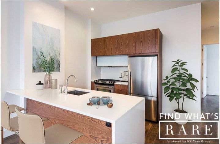 This 2 Bed, 2 Bath apartment has a balcony, private terrace with Manhattan skyline views, and many closets throughout !