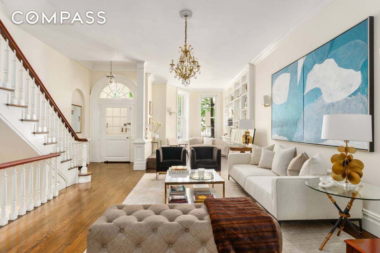 This exceptional two townhouse compound 166 East 81st connecting through the double garden with with 179 East 80th St.