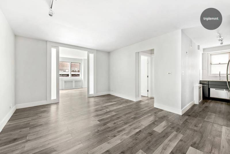 This converted two bedroom is NEWLY RENOVATED.